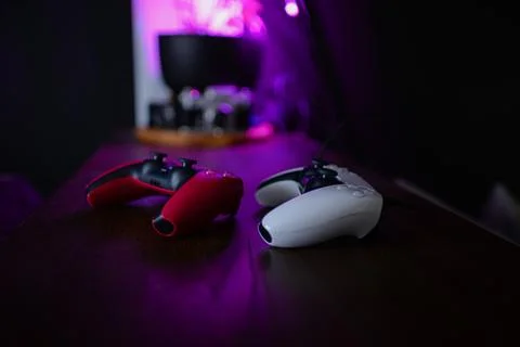 Retro neon game controller. Gamepad for games. Sci-fi Cyber futuristic purple Stock Photos