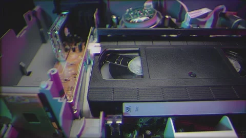 Retro Neon VHS Tape Playing in a VCR Dol... | Stock Video | Pond5