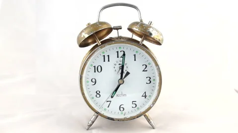 Retro old clockwork alarm clock Stock Footage 50614856