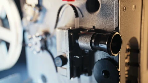 Retro old-fashioned 8mm projector playing movie theater.Authentic vintage cinema Stock Footage 263556835