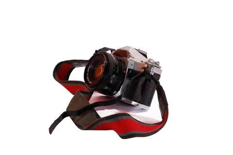 Retro or old camera isolated on white background. Camera with 50mm lens. Taken Stock Photos