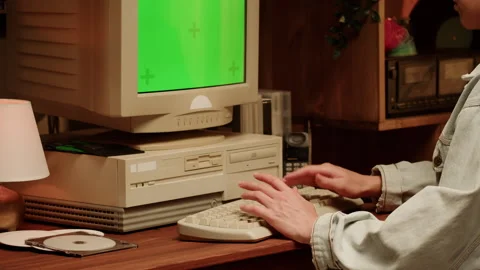 Retro PC with croma key green screen, Using vintage old computer. Dvd player Stock Footage 244060282