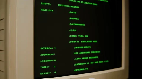 Retro pc with loading code console, programmer making scripts, green basic Stock Footage 214980386
