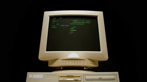 Retro pc with loading code console, programmer making scripts, green basic Stock Footage 214986489