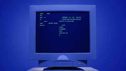 Retro pc with loading code console, programmer making scripts, green basic Stock Footage 214989708