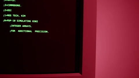 Retro pc with loading code console, programmer making scripts, green basic Stock Footage 218272372