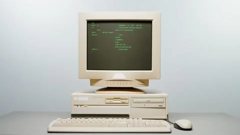 Retro pc with loading code console, programmer making scripts, green basic Stock Footage 219886793