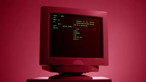 Retro pc with loading code console, programmer making scripts, green basic Stock Footage 219886876