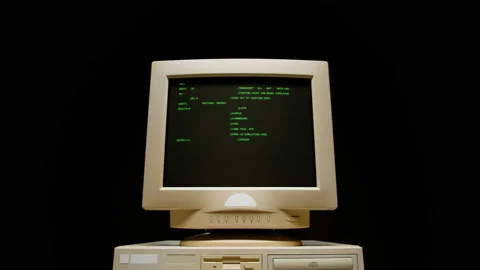 Retro pc with loading code console, programmer making scripts, green basic Stock Footage 220368336