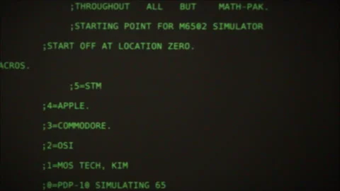 Retro pc with loading code console, programmer making scripts, green basic Stock Footage 220369049