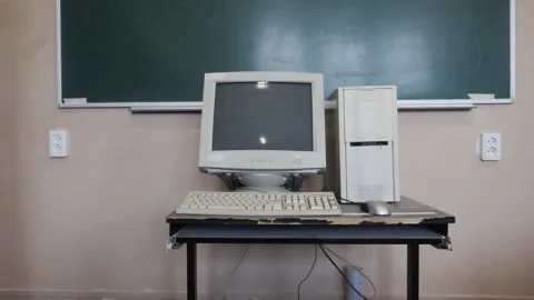 Retro Personal Computer With Keyboard And Monitor In The Classroom Stock Footage 257946129