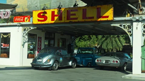 Retro petrolium station of "Shell" with retro cars Stock Footage 330944811