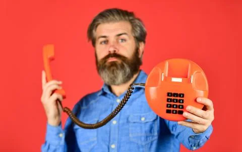 Retro phone. Outdated technology. Manager phone dialog communication. Call me Stock Photos