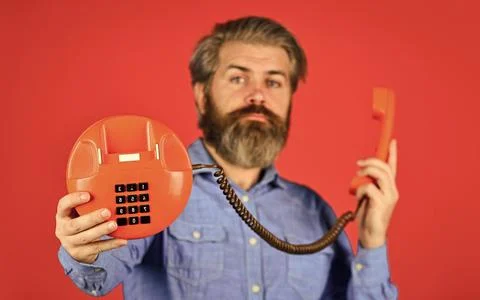 Retro phone. Outdated technology. Manager phone dialog communication. Call me Stock Photos