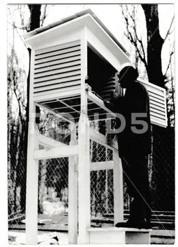 Retro photo shows meteorologist to control temperature. Vintage black & white Stock Photos