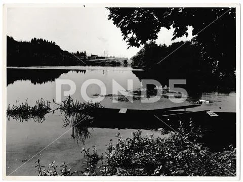 Retro photo shows view on the lake. Black & white vintage photography Stock Photos