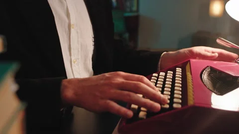 Retro pink typewriter in the library details man type some text on the white Stock Footage 144216355