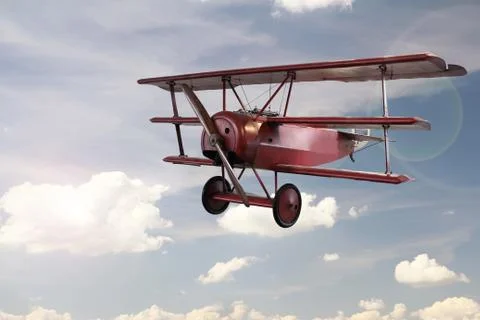 Retro plane flying on sky Stock Photos