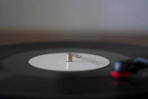 Retro Record Player Needle on a Spinning Vinyl  Stock Photos