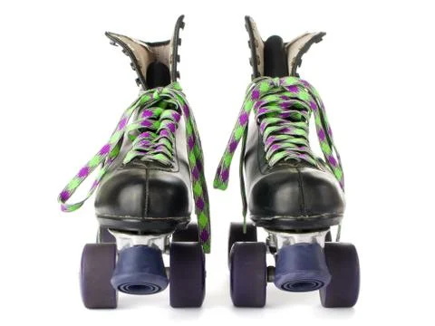 Retro roller skates isolated on white background. Stock Photos