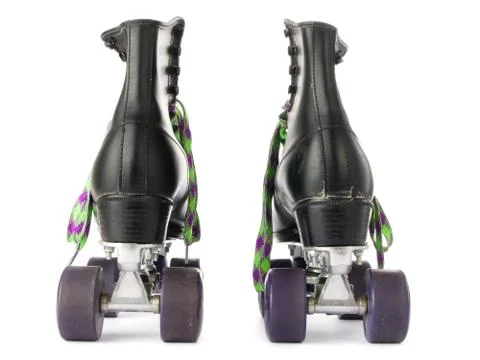 Retro roller skates isolated on white background. Stock Photos