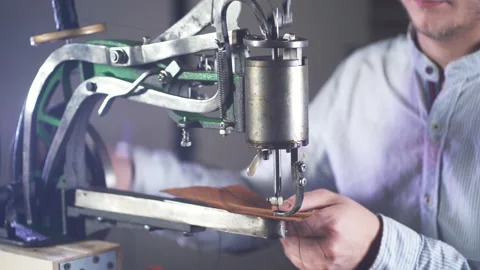 Retro Sewing Machine Needle. Leather craftsman creates a craft product. 스톡 동영상 130215380