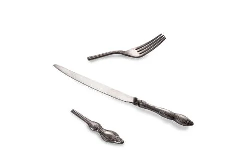 Retro silver knife cut fork isolated on white background Stock Photos