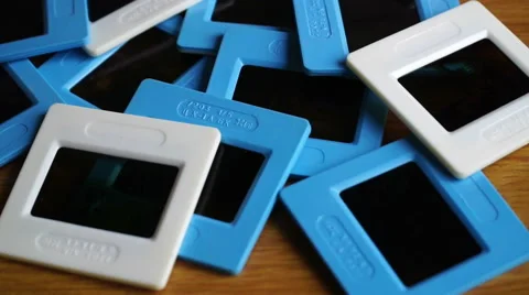 Retro slides frames on wooden background Stock Footage 62373082