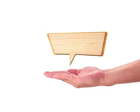 Retro speech bubbles from splat on hand Stock Photos