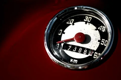 Retro speedometer of a red moped Stock Photos