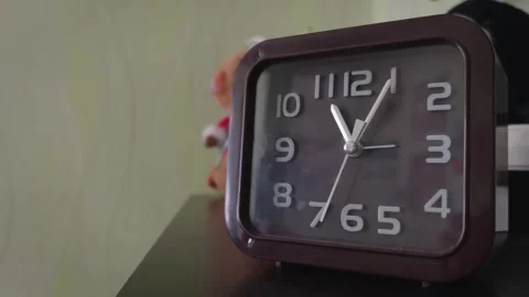 Retro Square Analog Clock Ticking on a Bedroom Nightstand Stock Footage 315336011