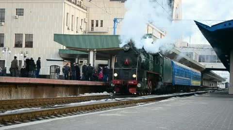 Retro steam engine, blue wagon line, Central Railway Station, Kiev, UKRAINE. Stock Footage 21763117