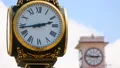 Retro style clocks decorating old park and central city square, measuring time HD Footage