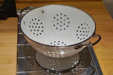 Retro style colander Stock Photos