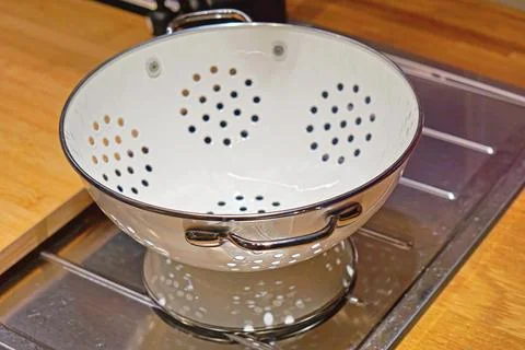 Retro style colander Stock Photos