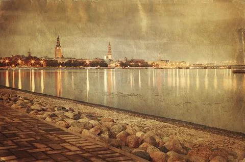 Retro style image of night Riga cityscape. Latvia Ilustração Stock