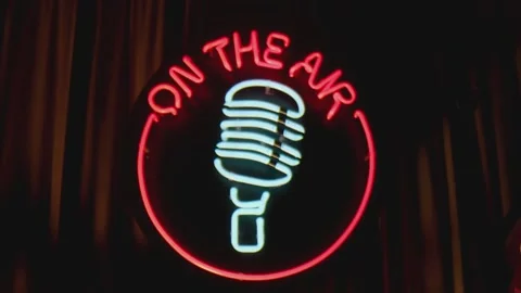 Retro style neon microphone sign hanging on the wall in club or pub . Stock Footage 167305069