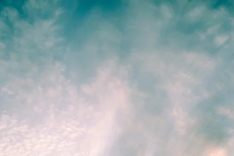 Retro style sky background. Clouds and sky with vintage colour tones Stock Photos