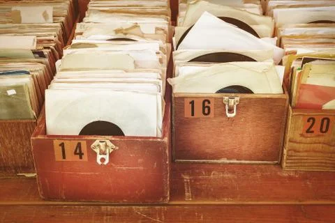Retro styled image of boxes with vinyl turntable records Stock Photos