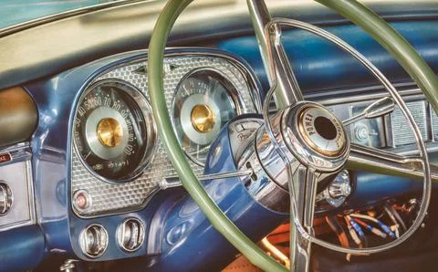 Retro styled image of a car interior of a fifties American classic car with.. Foto stock