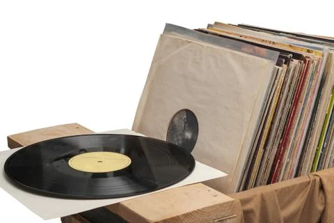 Retro styled image of a collection of old vinyl record lp's with sleeves, s.. Stock Photos
