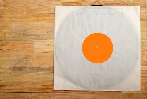 Retro styled image of a collection of old vinyl record lp's with sleeves on.. Stock Photos