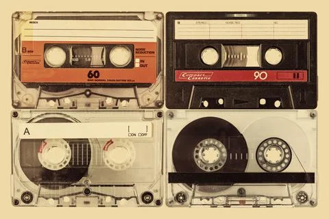 Retro styled image of four old audio compact cassettes Foto stock