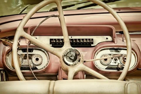 Retro styled image of the interior of a classic car Stock Photos