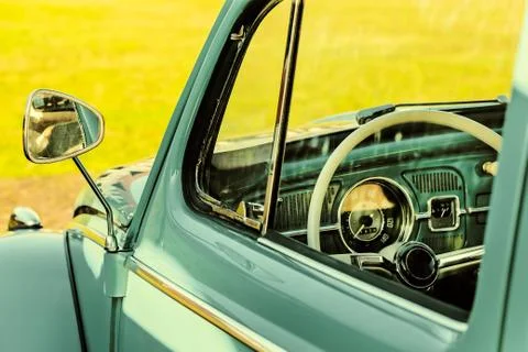 Retro styled image of the interior of a classic car Stock Photos