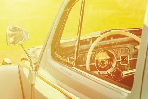 Retro styled image of the interior of a classic car Stock Photos