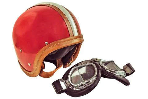 Retro styled image of an old motor helmet with goggles Foto stock