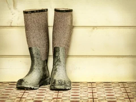 Retro styled image of an old pair of boots Stock Photos