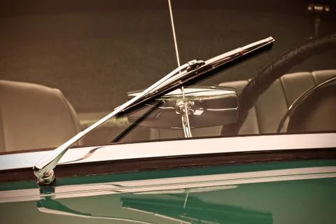 Retro styled image of the screen wiper of a classic car Stock Photos