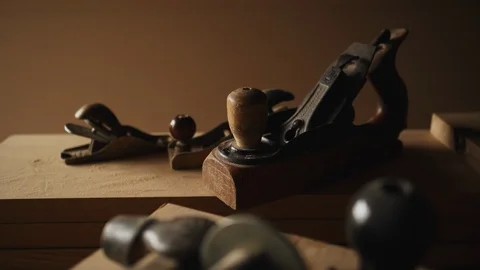 Retro stylized old tools on wooden table in a joinery. Stock Footage 89308096